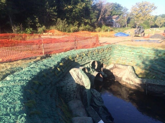 safety fencing and erosion controls over culvert on right-of-way
