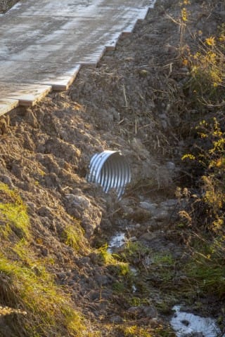 a culvert protected by a TerraLam access road